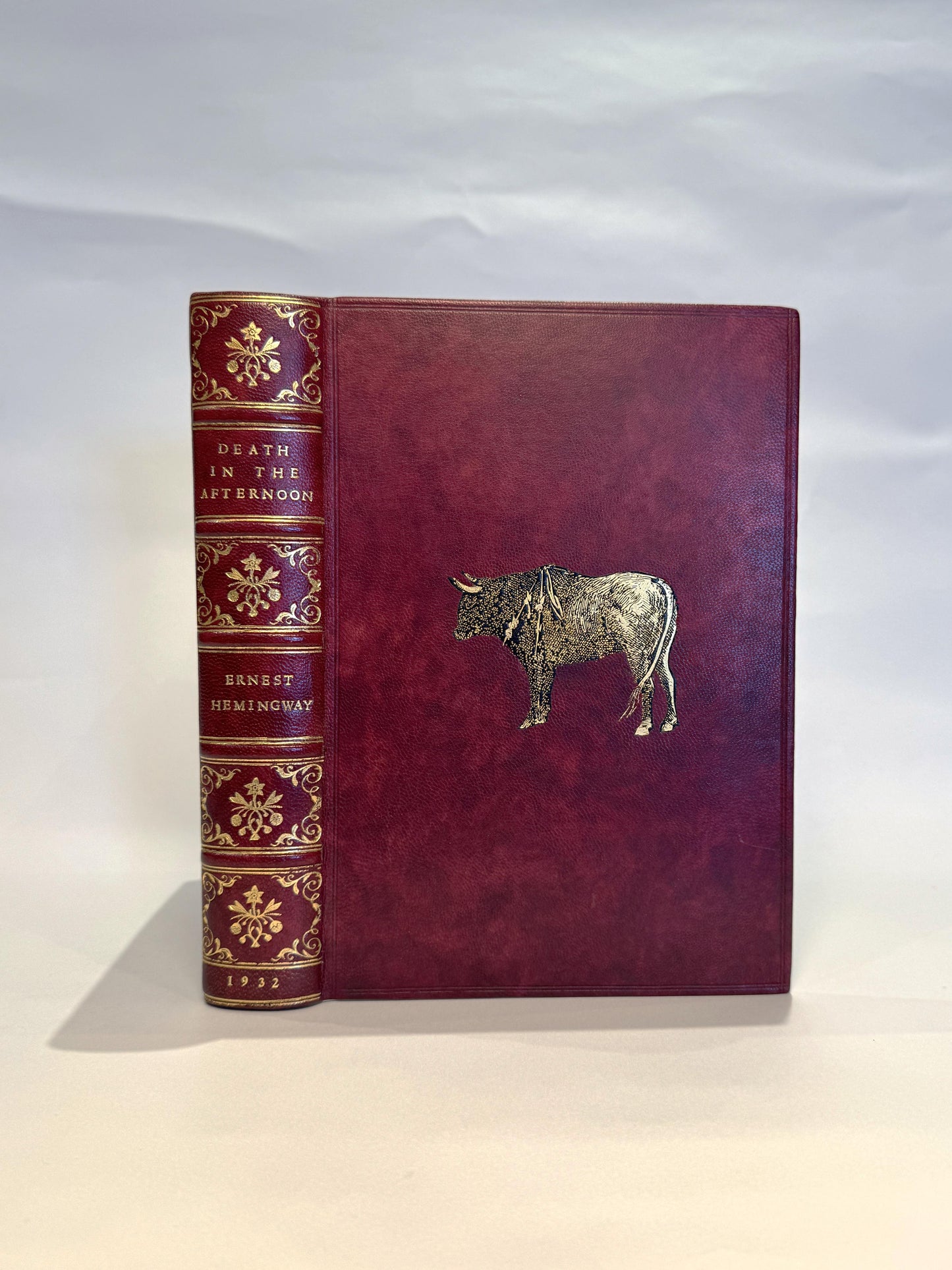 Ernest Hemingway - Death in the Afternoon in Fine Red Morocco Binding with Gilt Bull