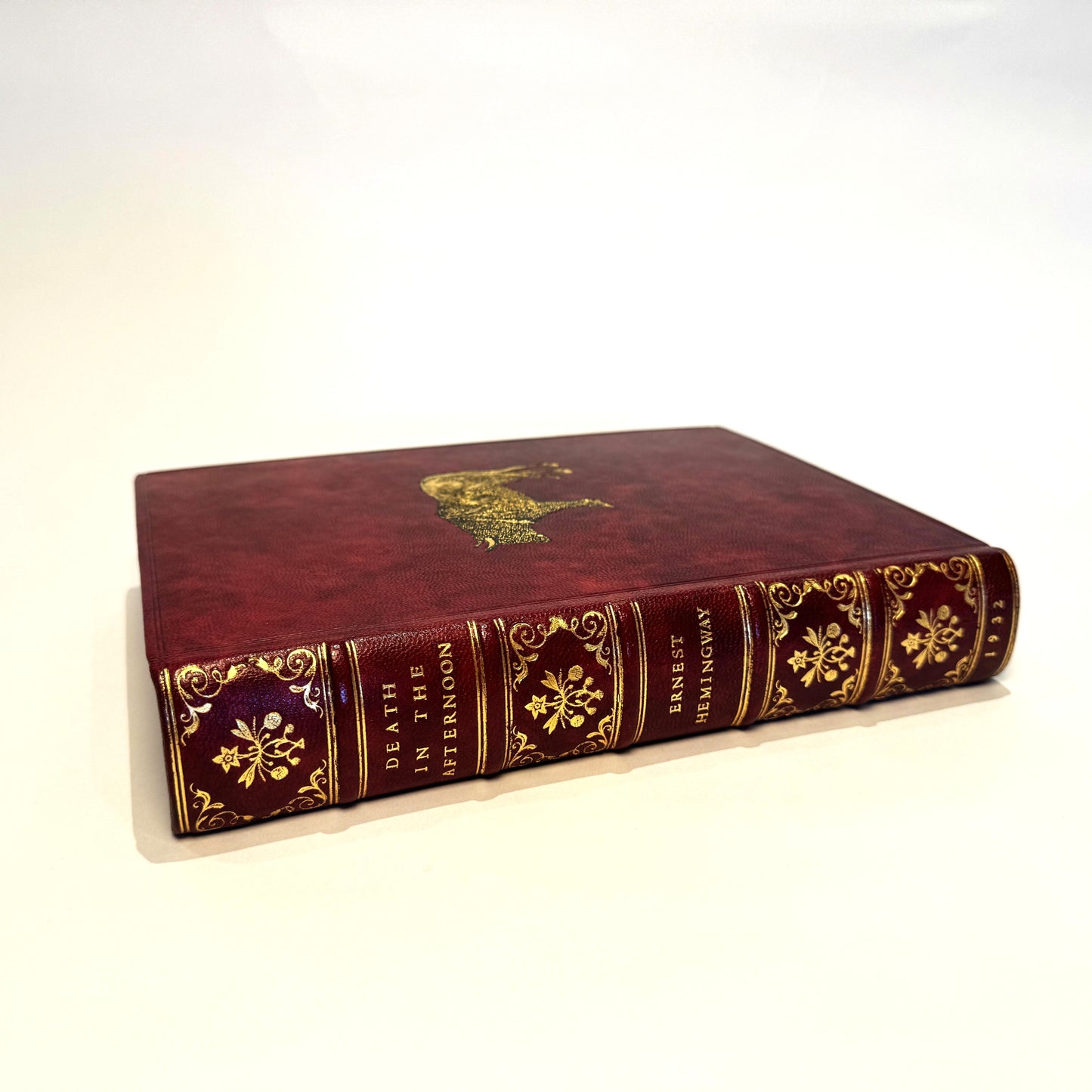 Ernest Hemingway - Death in the Afternoon in Fine Red Morocco Binding with Gilt Bull